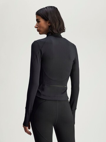 Vestes d’entraînement ADIDAS BY STELLA MCCARTNEY en noir