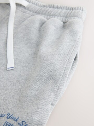 Superdry - Conjunto en gris