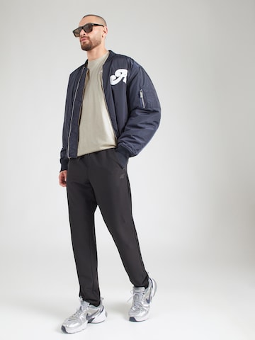 Regular fit Maglietta 'CLUB' di Nike Sportswear in beige