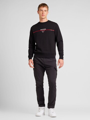 TOMMY HILFIGER Sweatshirt in Black