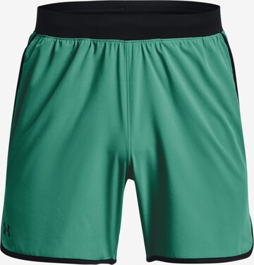 UNDER ARMOUR Workout Pants in Green: front