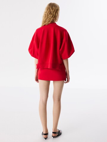 Veste de survêtement Twist en rouge