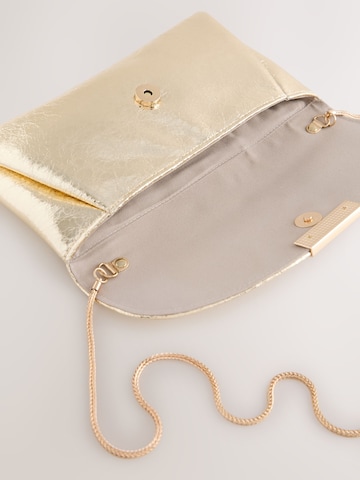 Clutch de la Next pe auriu