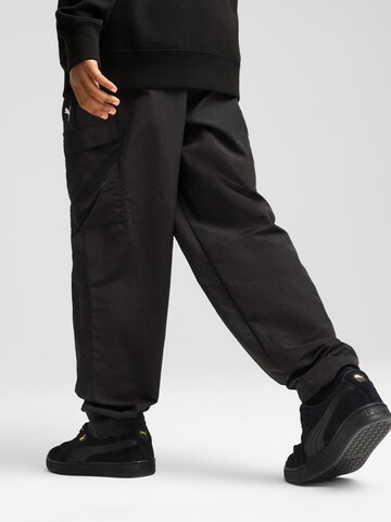 PUMA Loosefit Παντελόνι φόρμας 'WARDROBE ESS' σε μαύρο