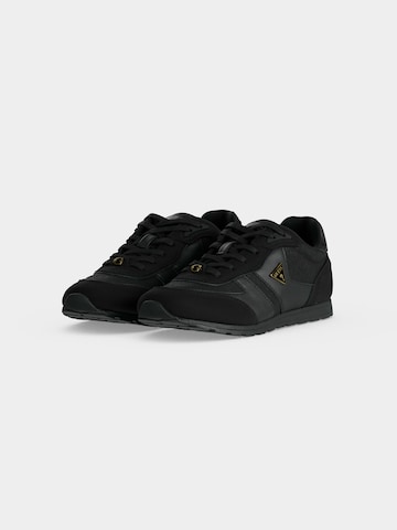 GUESS Sneaker 'TYRAH' in Schwarz