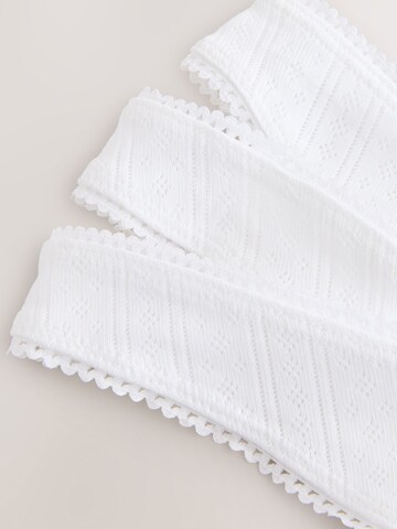 String Next en blanc