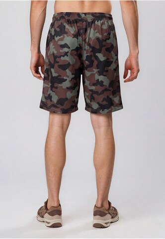 regular Pantaloni di Karl Kani in colori misti