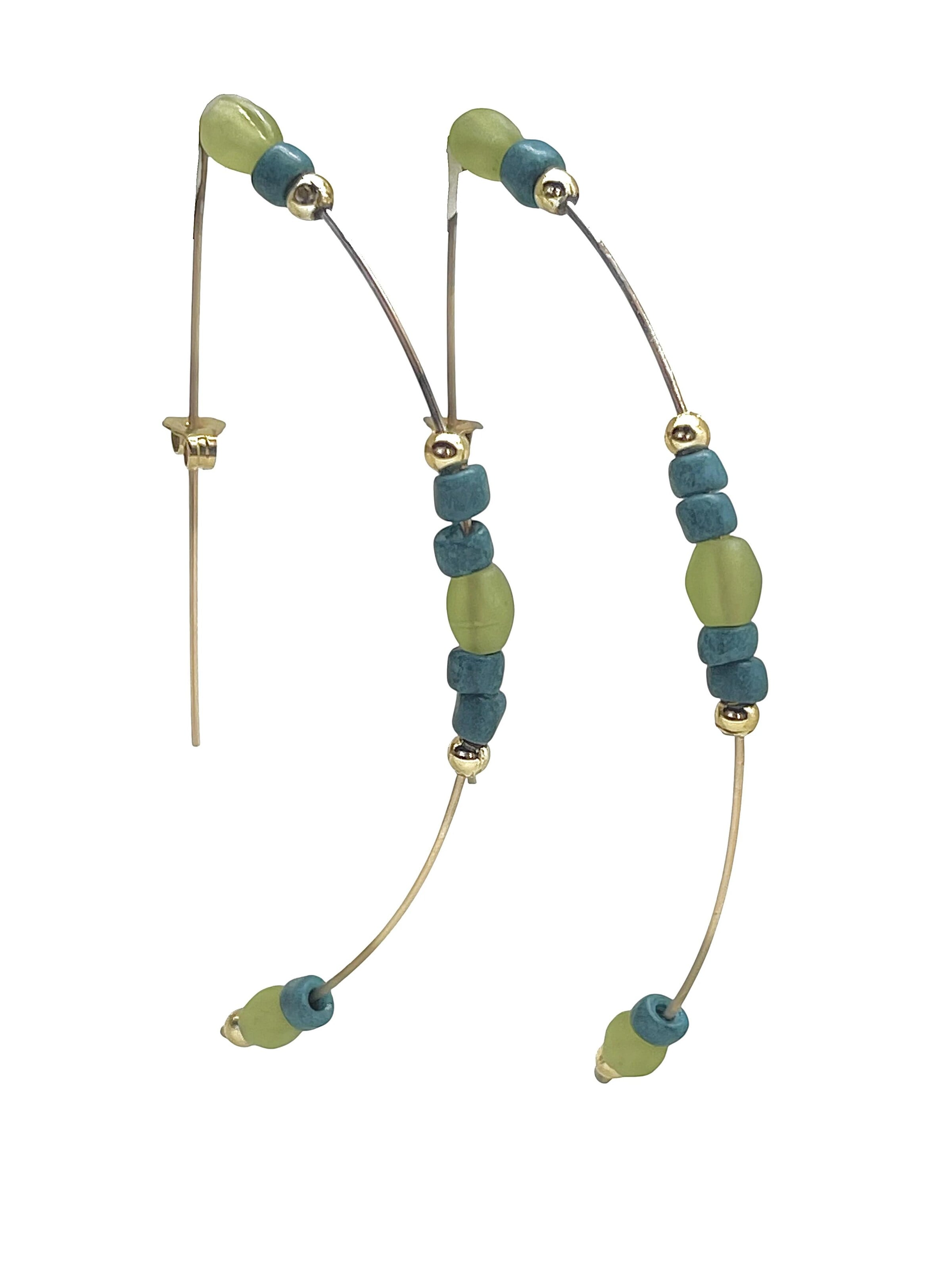 Gloria Mago Earrings 'Gold-plated arch pendant with olivine crystal' in Green: front