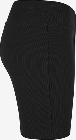 Skinny Leggings di Karl Kani in nero