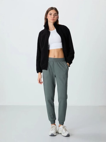 Pantaloni sportivi 'Jogginghose' di Tommy Life in grigio: frontale