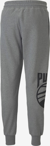 Effilé Pantalon de sport PUMA en gris