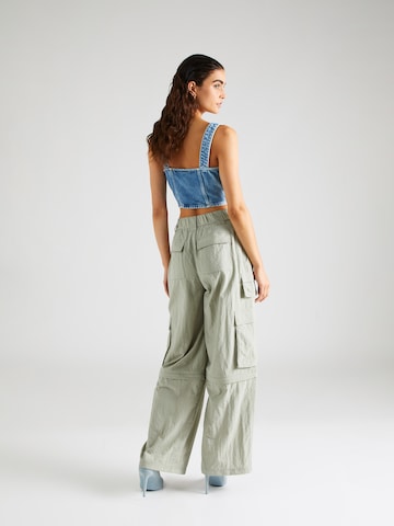 Wide leg Pantaloni cu buzunare 'Claire' de la Tommy Jeans pe verde