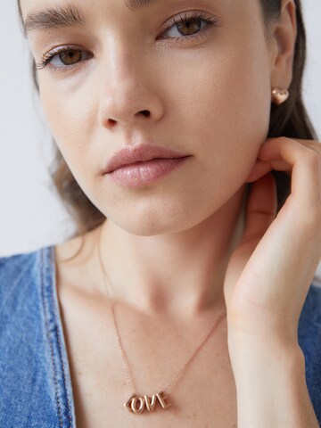 Echtzeit Earrings in Gold