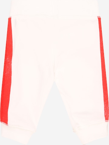 GAP Zwężany krój Spodnie w kolorze biały