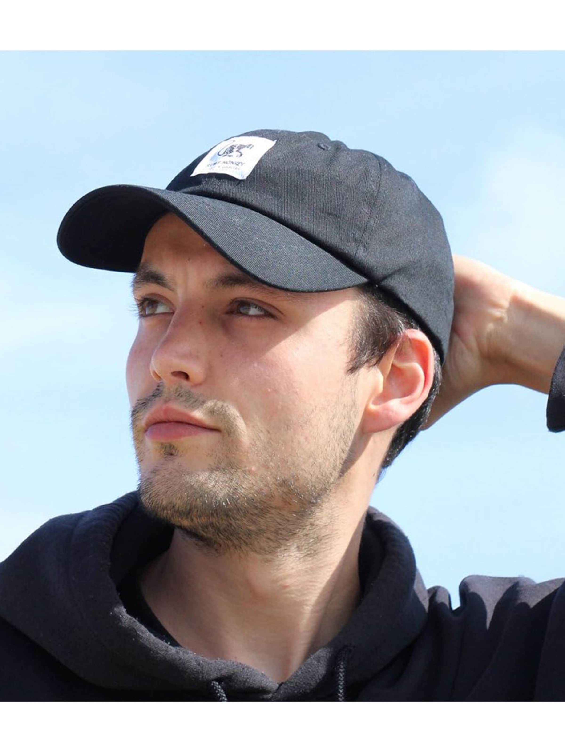 Cappello da baseball sportivo di Surf Monkey in nero