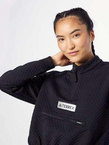 ADIDAS TERREX Neulepaita 'Utilitas Fleece' värissä musta