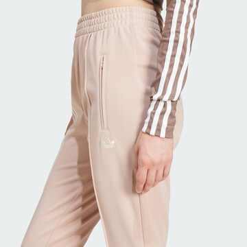évasé Pantalon 'Firebird' ADIDAS ORIGINALS en rose