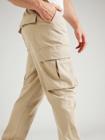 ABOUT YOU x Jaime Lorente Tapered Cargo Pants 'Adriano' in Beige