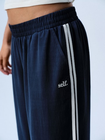 self. - Pierna ancha Pantalón en azul