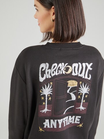 SCOTCH & SODA Sweatshirt 'FRONT BACK FESTIVE ARTWORK' in Schwarz