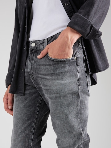 Slimfit Jeans 'Skim' di SCOTCH & SODA in grigio