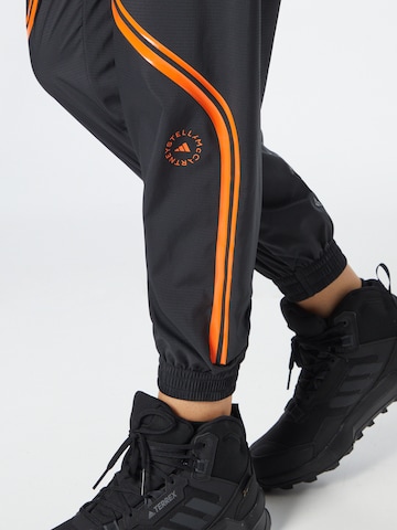 Regular Pantalon de sport 'TruePace' ADIDAS BY STELLA MCCARTNEY en noir