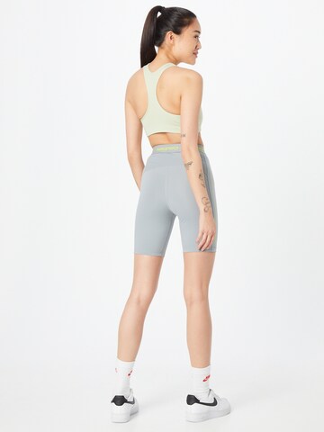 NIKE Skinny Spodnie sportowe w kolorze szary