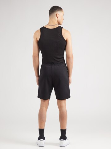 regular Pantaloni di Champion Authentic Athletic Apparel in nero