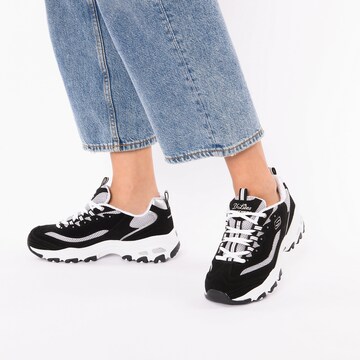 SKECHERS Sneakers in Black