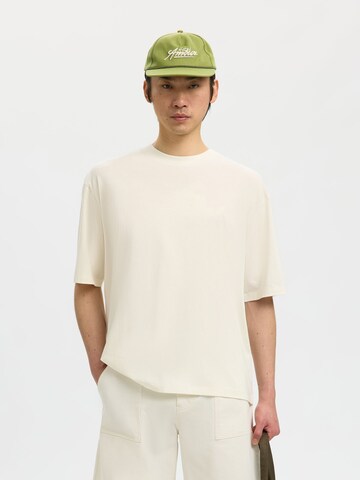 SELECTED - Gorra 'Selected x Hotel Amour' en verde: frente