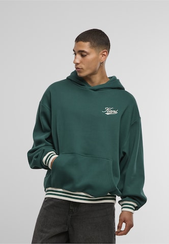 Karl Kani Sweatshirt 'Cursive Varsity' in Grün: Vorderseite