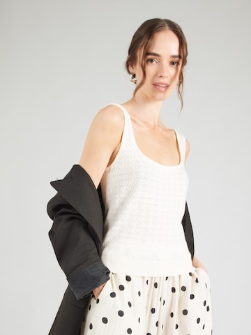 Top in maglia 'NINA' di GUESS in beige: frontale