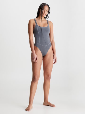 Calvin Klein SwimwearT-shirt Jednodijelni kupaći kostim - siva boja