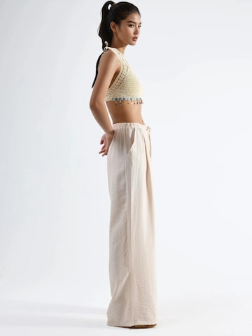 Wide leg Pantaloni con pieghe di Busem in beige