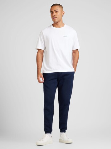 Tapered Pantaloni di Tommy Jeans in blu