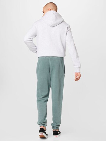 Tapered Pantaloni di Superdry in verde