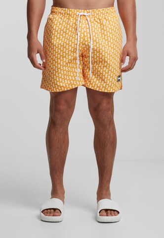 Shorts de bain Urban Classics en orange : devant