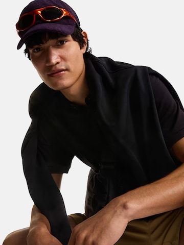 THE NORTH FACE - Camiseta 'THE NORTH FACE M ESS RG POLO TEE POLO' en negro