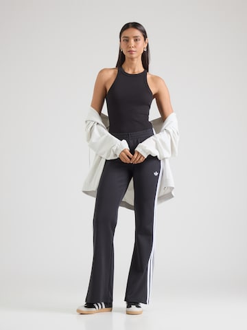 évasé Pantalon ADIDAS ORIGINALS en noir