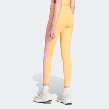 ADIDAS SPORTSWEAR Skinny Workout Pants 'Essentials' in Yellow