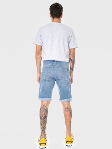 Carhartt WIP Baggy Jeans 'Swell' in Blauw