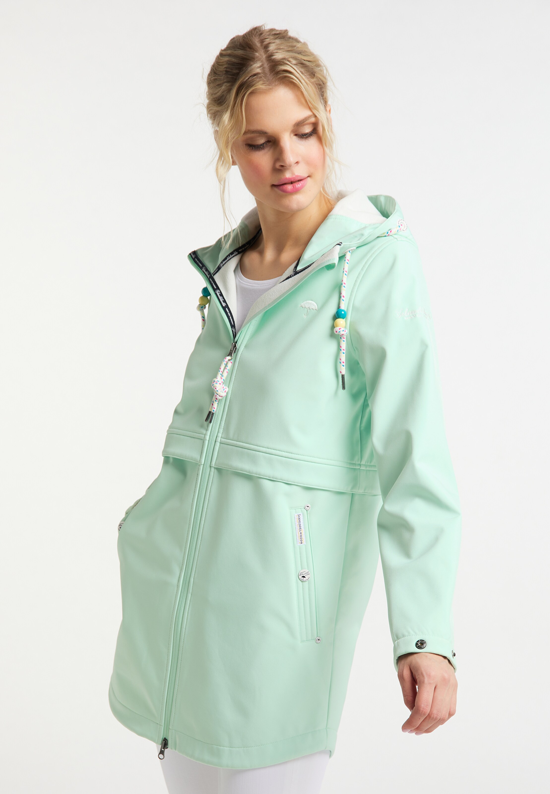 mint green rain jacket