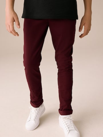 Next Slimfit Housut värissä punainen: etupuoli