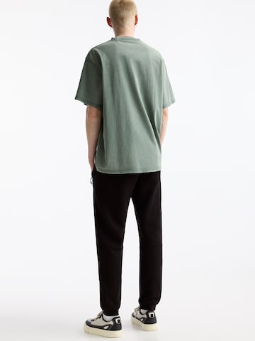 Pull&Bear Tapered Trousers in Black