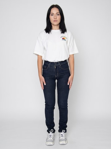 LEVI'S ® Luźne Jeansy '724 High Rise Straight Blue Wave Rinse Dark Indigo Worn In' w kolorze niebieski