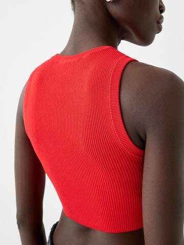 Top in maglia di Bershka in rosso