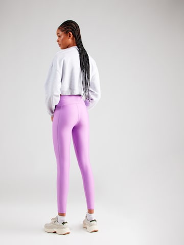 UNDER ARMOUR - Skinny Calças de desporto em roxo