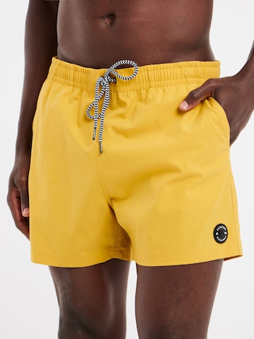 PROTEST Swimming shorts 'PRTYESSINE' in Yellow: front