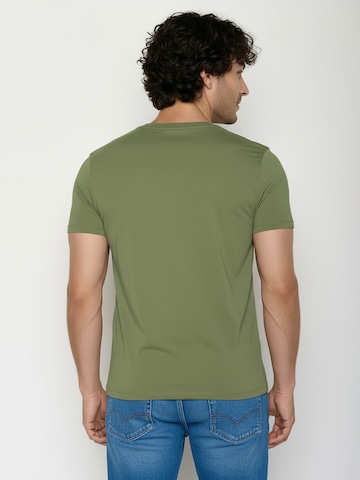 Maglietta ' Guide Smokey Walrus ' di GREENBOMB in verde