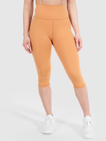 Smilodox Skinny Workout Pants 'Caprice' in Orange: front